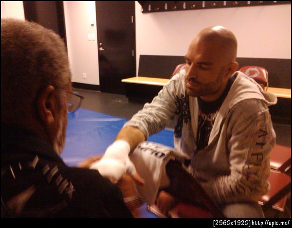 getting my hands wrapped by Leon.  Fight in about 2 hrs. #ufc #mma