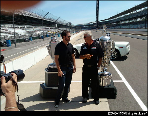 JJ and his racing idol Rick Mears in front of some famous trophies at Indy
